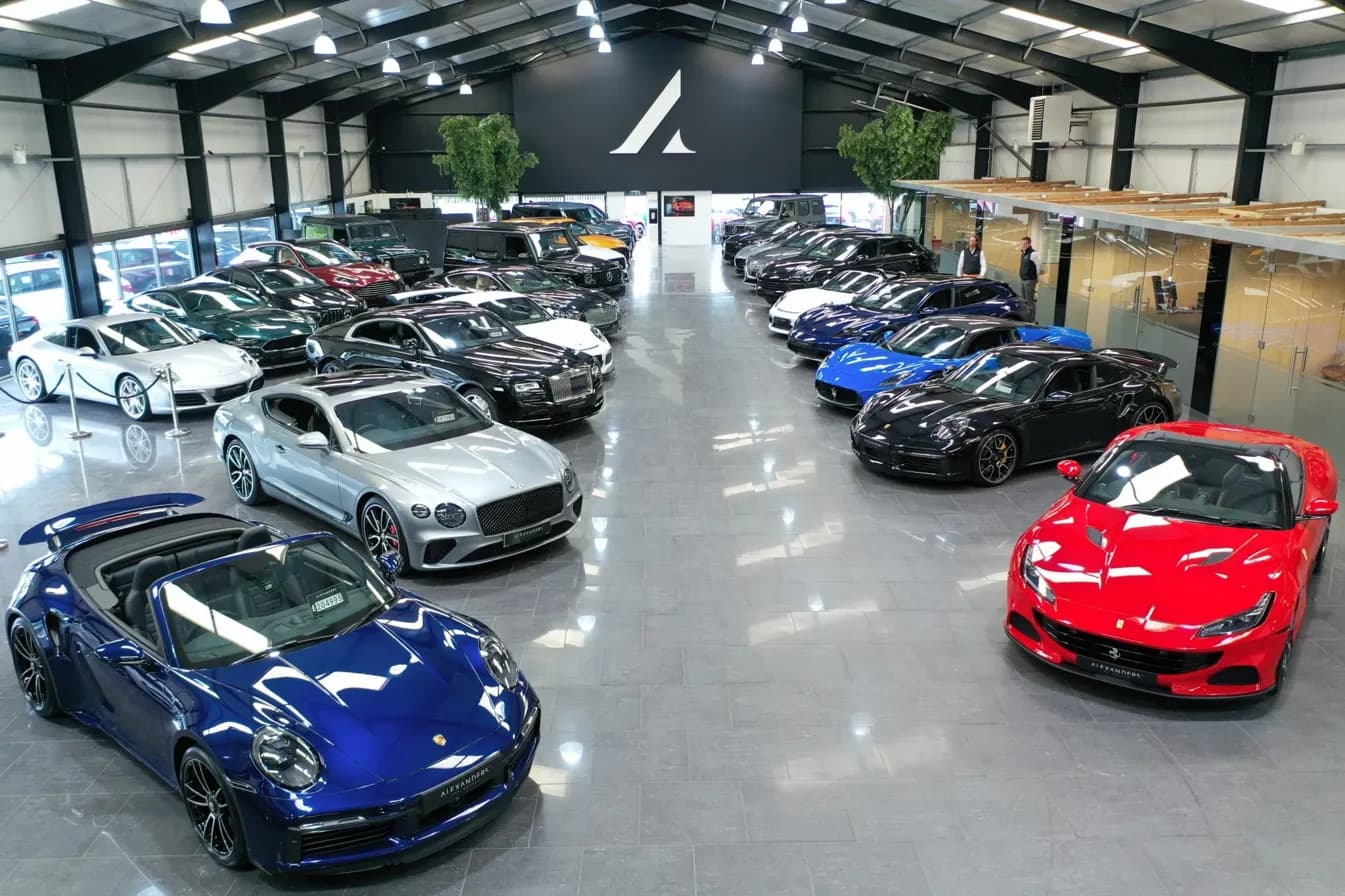 The Alexanders Prestige showroom floor, with prestige stock from Porsche, Ferrari, Bentley and Rolls-Royce